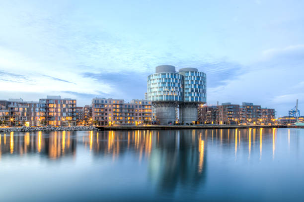 Portland Towers in Nordhavn district in Copenhagen Copenhagen, Denmark - March 12, 2017: Evening view of the Portland Towers, two silos converted into office bildings in the Nordhavn district. copenhagen stock pictures, royalty-free photos & images