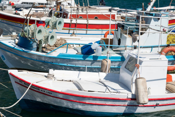 Old Colored Fishing boats in Naples harbour sea