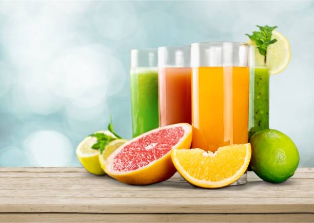 Fresh. Tasty fruits and juice on wooden table antioxidant photos stock pictures, royalty-free photos & images