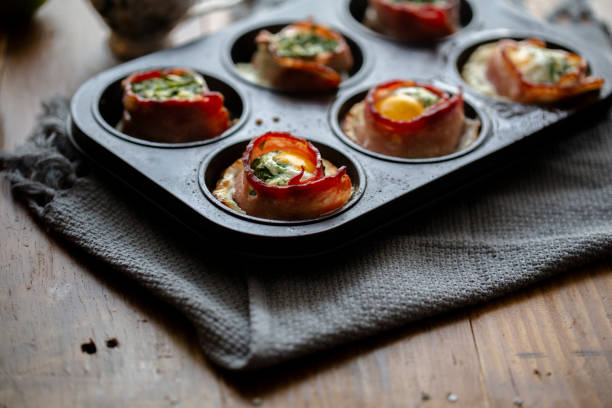 istock homemade healthy breakfast: bacon roll with egg and vegetable smash 1164351670