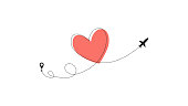 istock Love airplane route. Heart dashed line trace and plane routes isolated on white background. Romantic wedding travel, Honeymoon trip. Hearted plane path drawing. Vector illustration 1164352204