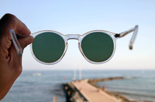 istock Looking through a pair of sunglasses 1164354428