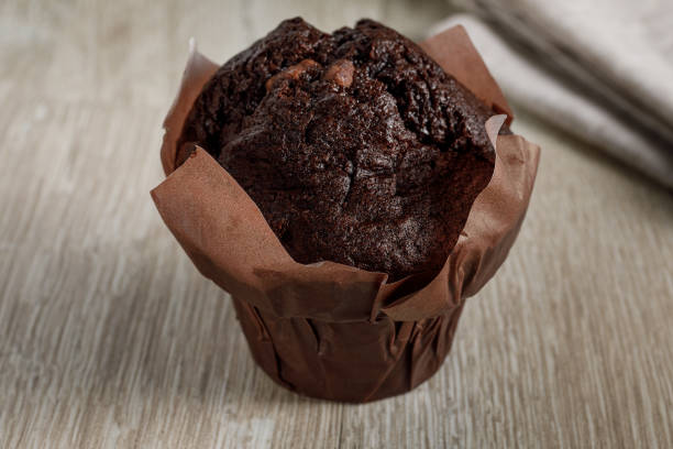 istock Chocolate cake in baking paper 1164358332