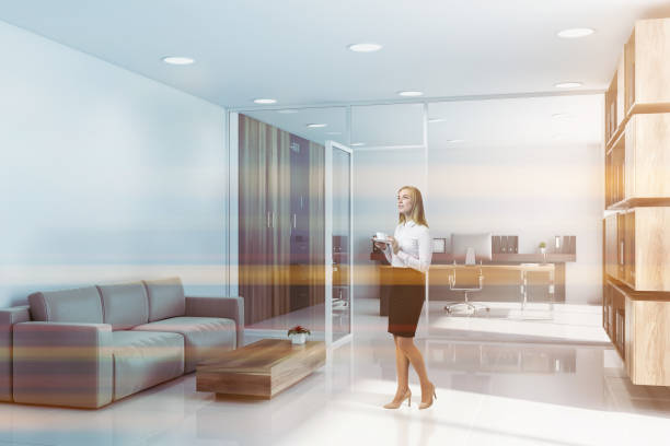 istock Woman in CEO office with lounge 1164360250