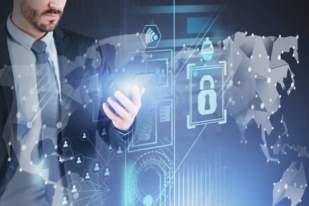 istock Businessman with phone, global digital security 1164360498