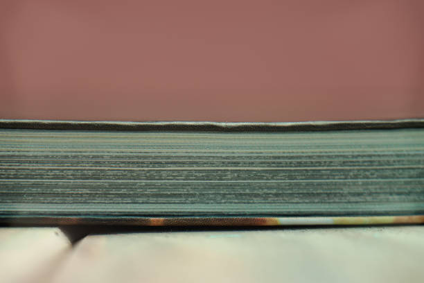 Close up beautiful book on a wooden table background.