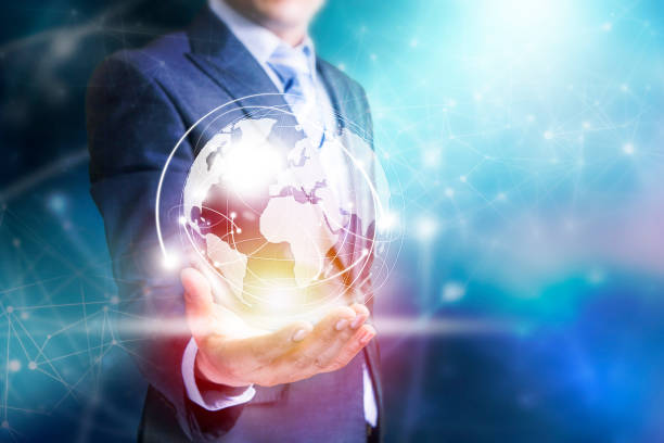 Businessman with virtual Earth map point with network connection on hand