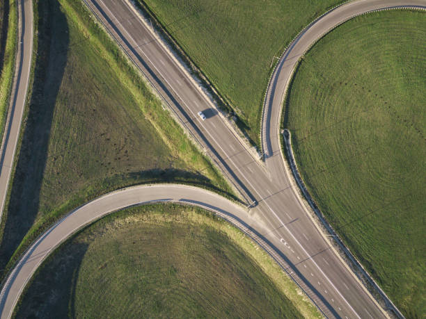 istock Road Junction highway intersection summer morning with car. Aerial Top View 1164364819