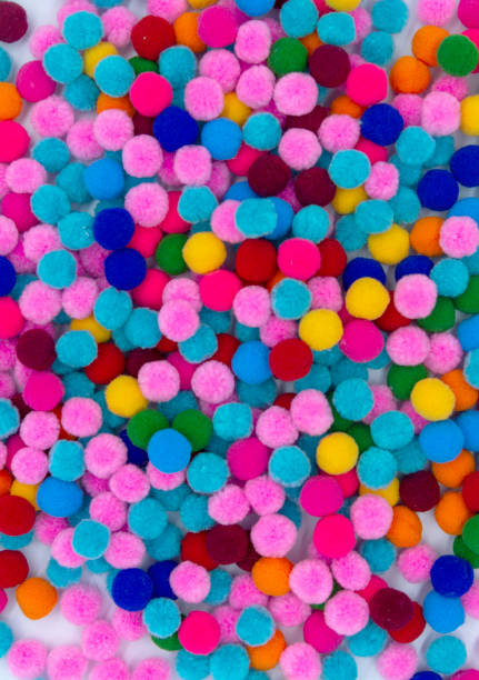 istock A colorful of Pom Pom background 1164366616