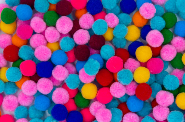 istock A colorful of Pom Pom background 1164366623