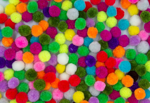 istock A colorful of Pom Pom background 1164367153