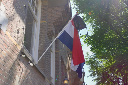 23-07-2019 old tradition of holland hanging out a flag with a schoolbag when graduating high school