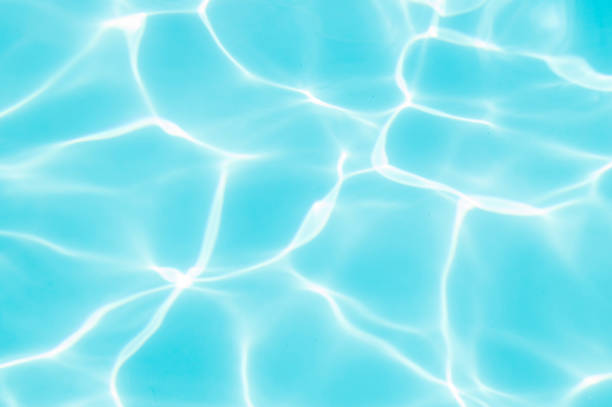 istock Blue water in the pool water ripple detail abstract background 1164367628