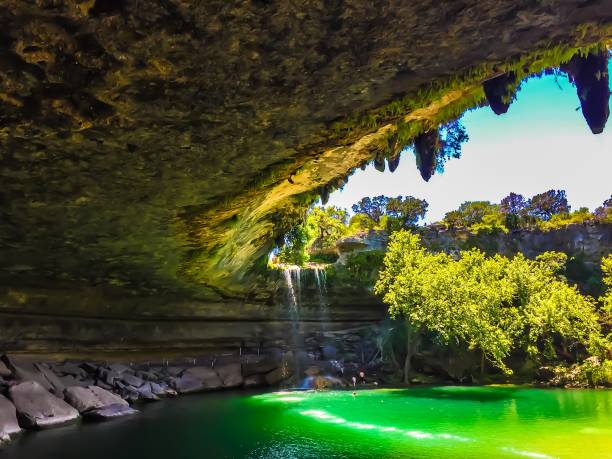 Hamilton Pool, Austin TX, USA Hamilton Pool, located in the Hill Country outside of Austin Texas. May 2017 grotto cave photos stock pictures, royalty-free photos & images