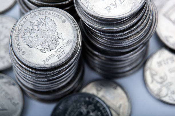 istock piles of Russian ruble coins close up 1164371991