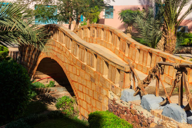 istock Beautiful small footbridge in a garden 1164372605
