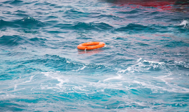 istock Orange lifebuoy ring sea life 1164375698