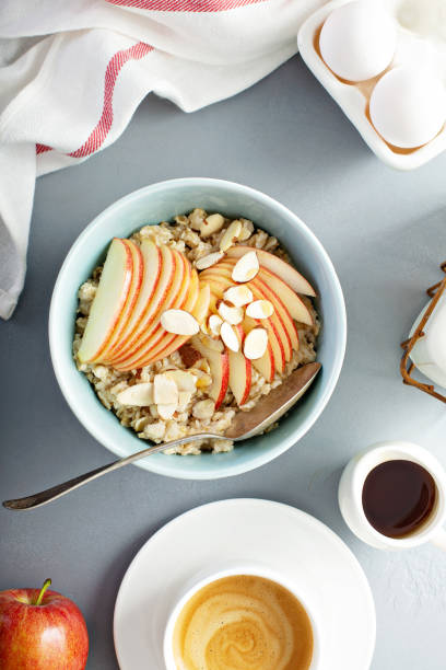 istock Healthy oatmeal with sliced apple and almonds 1164380672