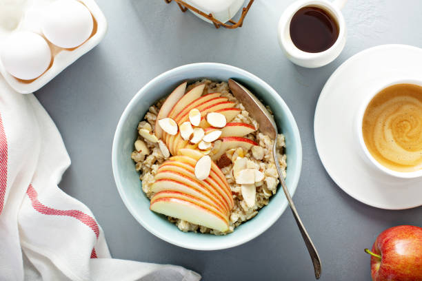istock Healthy oatmeal with sliced apple and almonds 1164380675