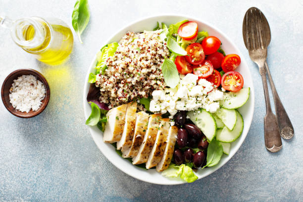 greek inspired lunch bowl with chicken and quinoa - chicken breast chicken grilled chicken protein imagens e fotografias de stock