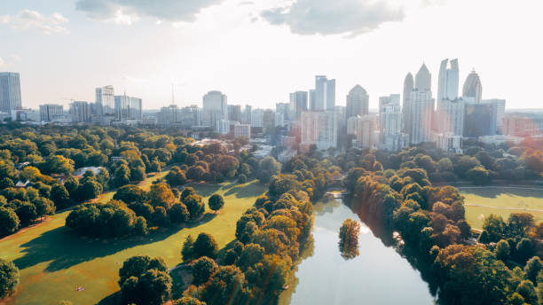 Aerial over Piedmont Park with Atlanta, GA Skyline stock photo