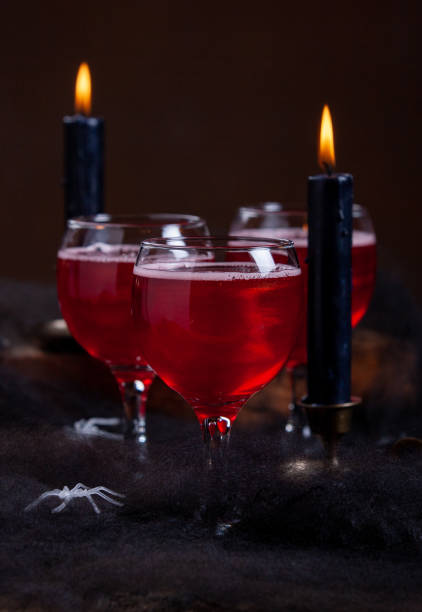 istock Halloween Poisoned Apple Cider Cocktail On Dark Moody Background 1164388326