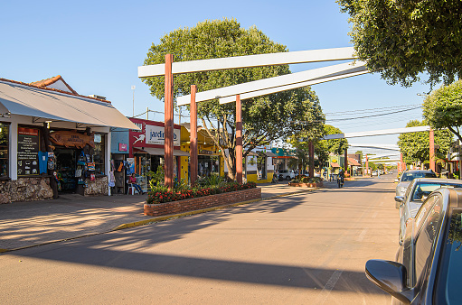 Bonito - MS, Brazil - June 24, 2019: Commerce around the main street of the city on downtown, Coronel Pilad Rebua street. Shops tha sells souvenirs and crafts, touristic destination of Bonito.