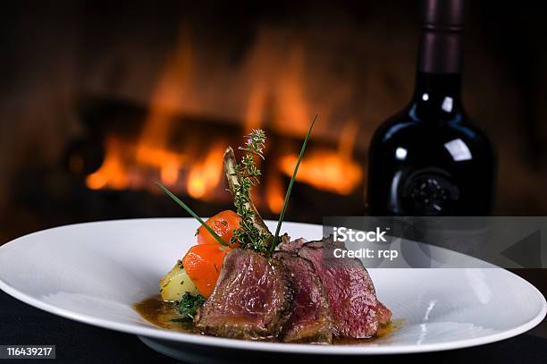 Lamb With A Bottle Of Wine Stock Photo - Download Image Now - Wine, Elegance, Lamb - Meat