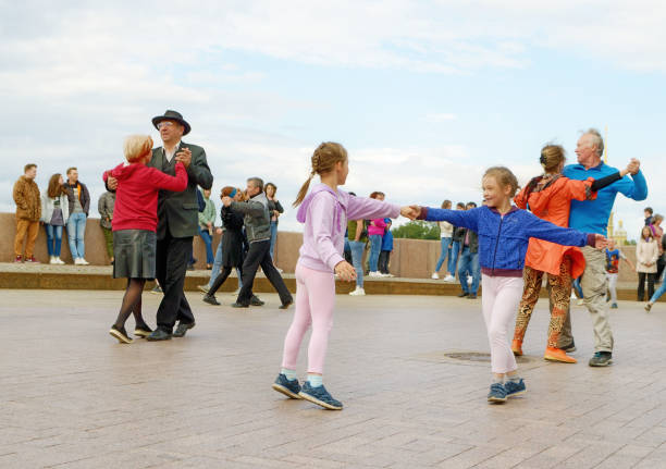 Saint-Petersburg.Russia.July 13.2019.Dancing in the town square in the fresh air.Anyone who wants to dance to music can take part.This is ballroom dancing Rumba, Tango, Salsa, Cha Cha, Samba.