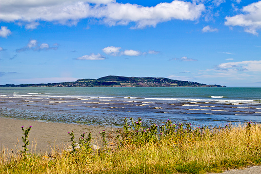Howth Head in Dublin, Ireland as viewed from Dollymount Strand.