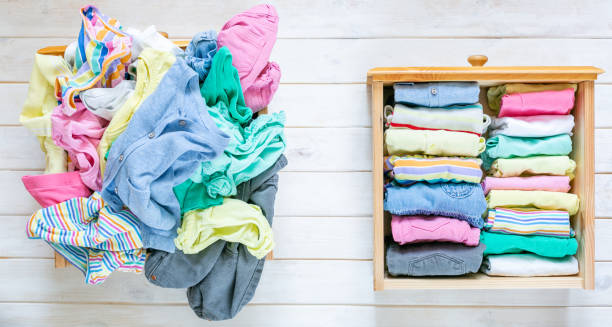 Marie Kondo tyding up method concept - before and after kids clothes drawer Marie Kondo tyding up method concept - before and after kids clothes drawer, copy space before and after photos stock pictures, royalty-free photos & images