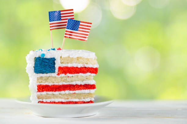 American national holidays concept - 4th of July, Memorial Day, Labour Day. Layered spounge cake in USA flag colours stock photo