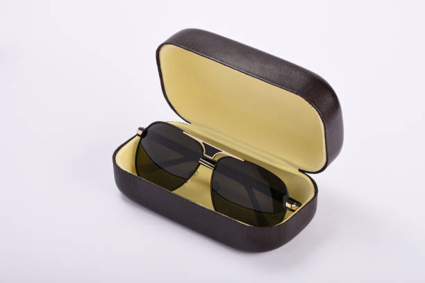 istock Sunglasses in a glasses case isolated on white 1164404560