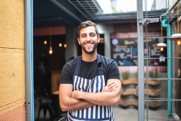 istock Portrait of young restaurant owner looking at camera 1164405889