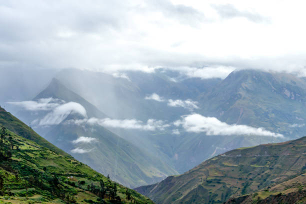 istock Blurred background with the cloud-covered mountain peaks of Apurimac river valley, Peru 1164406394
