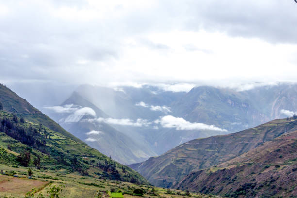istock Blurred background with the cloud-covered mountain peaks of Apurimac river valley, Peru 1164406522