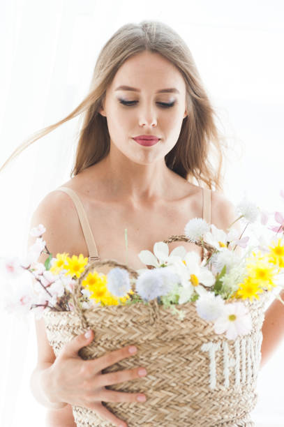 istock Beautiful blonde bride underwear morning in white interior 1164412582