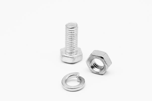 lavatrice, dado, vite su sfondo bianco - bolt nut washer threaded foto e immagini stock