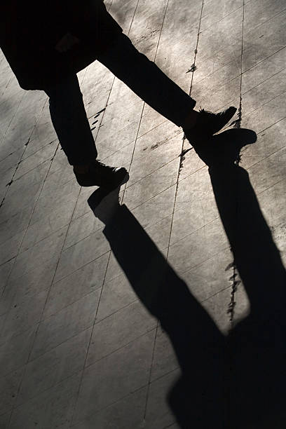 istock silhouette and shadow of a man on his way 116443215