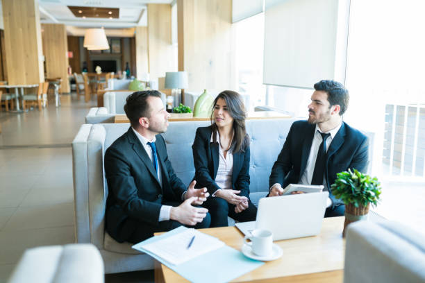 istock Entrepreneurs Discussing At Hotel During Meeting 1164434219