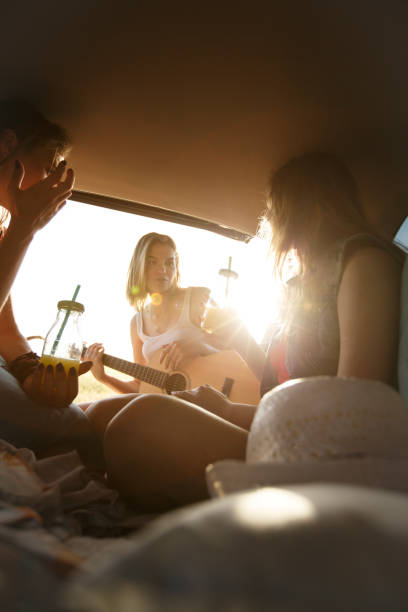 istock Friend making a rest stop on their road trip and relaxing together 1164435839