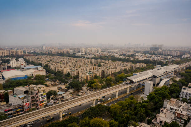 Aerial cityscape shot of Noida, delhi, grugaon at dusk night stock photo