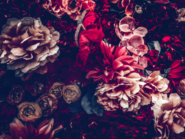 istock artificial flowers wall background with vintage style 1164436154