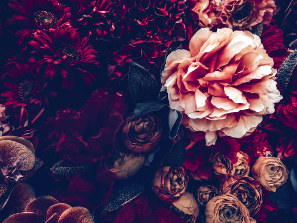 istock artificial flowers wall background with vintage style 1164436155