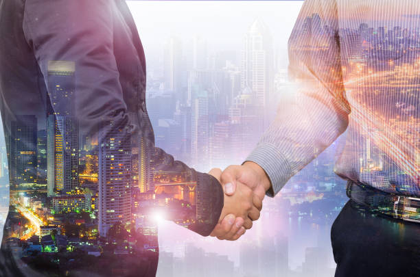 istock Double exposure of businessman 1164437259