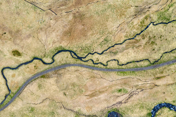 istock Aerial view of winding small river, Iceland 1164437290