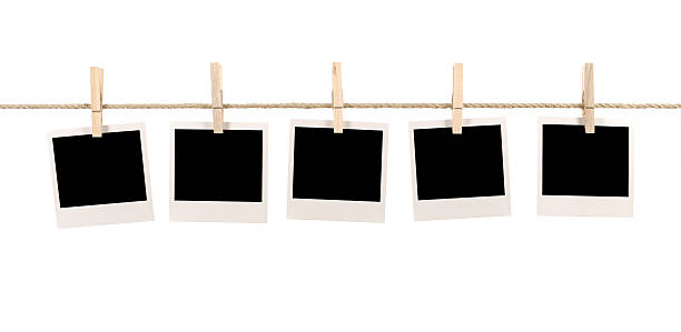 istock Blank instant photo prints on a washing line 116445617