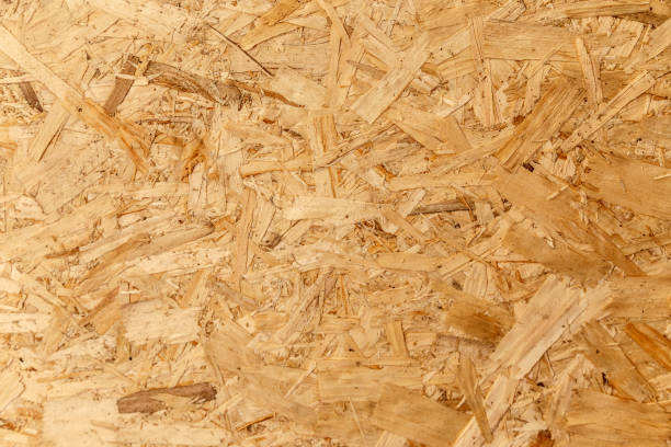 istock Pressed wooden panel background, seamless texture of oriented strand board - OSB 1164461382