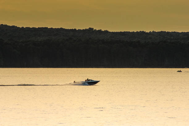 istock Boating in the lake at dusk 1164464191