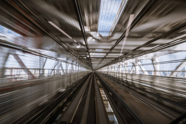 istock motion-blurred view from a moving train running in tunnel 1164464200